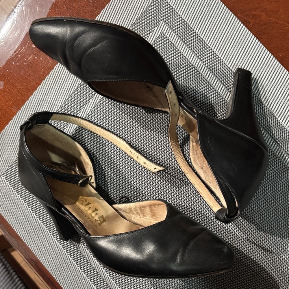 Black leather close toes tango heels